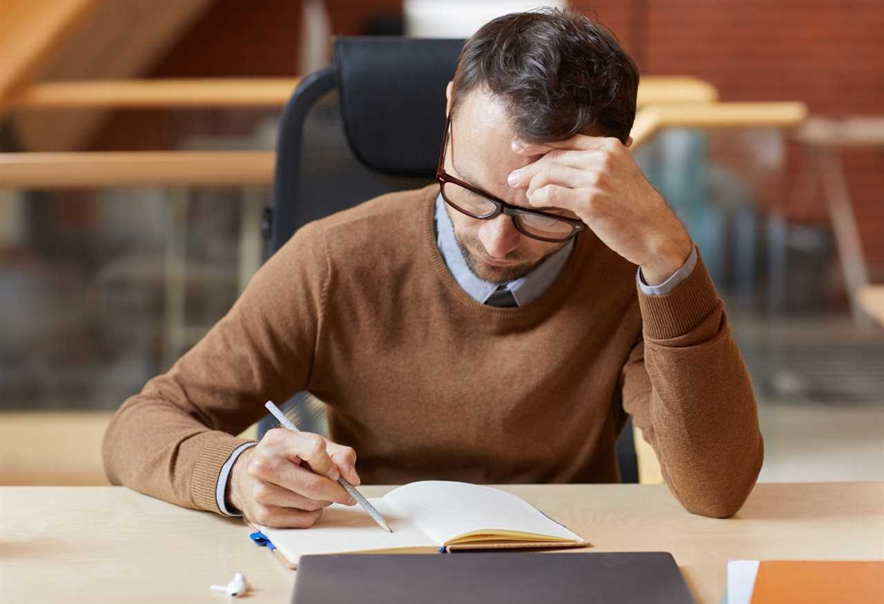 a man planning in a book for things to go wrong