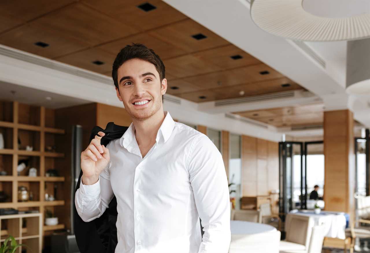 man in dress shirt smiling