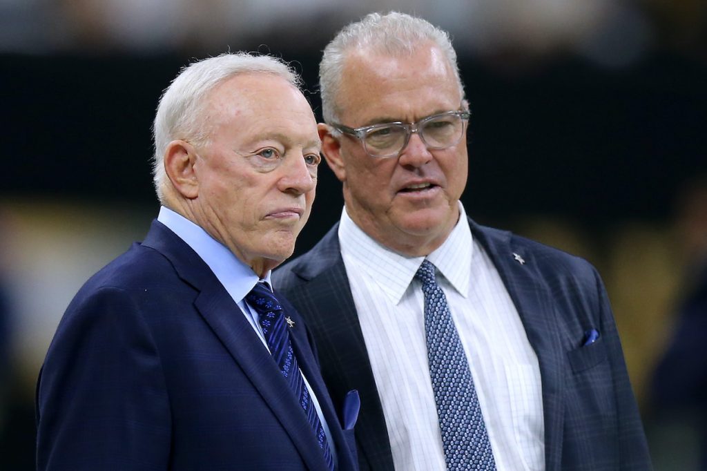 Owner Jerry Jones of the Dallas Cowboys and Executive Vice President Stephen Jones talk before a game against the New Orleans Saints at the Mercedes Benz Superdome on September 29, 2019 in New Orleans, Louisiana.