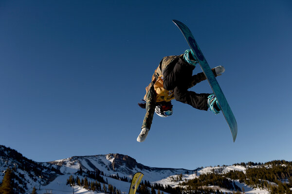 Kim, shown competing in 2014, was already among the best in the world when she was 13, but she was too young to qualify for the Olympics. Now 21, hardened by the experience that made her famous, she is the defending gold medalist in the halfpipe.