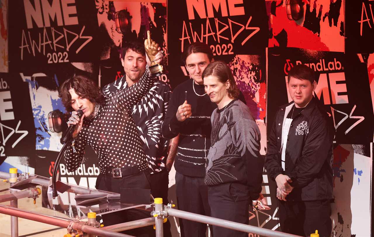 Bring Me The Horizon accepting the trophy for Best Band From The UK Supported by Pizza Express at the BandLab NME Awards 2022