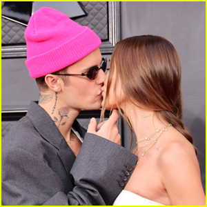 Nominee Justin Bieber Kisses Wife Hailey on Grammys 2022 Red Carpet