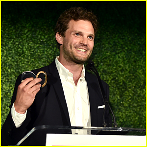 Jamie Dornan Uses Handcuffs to Make 'Fifty Shades' Joke While Accepting an Award