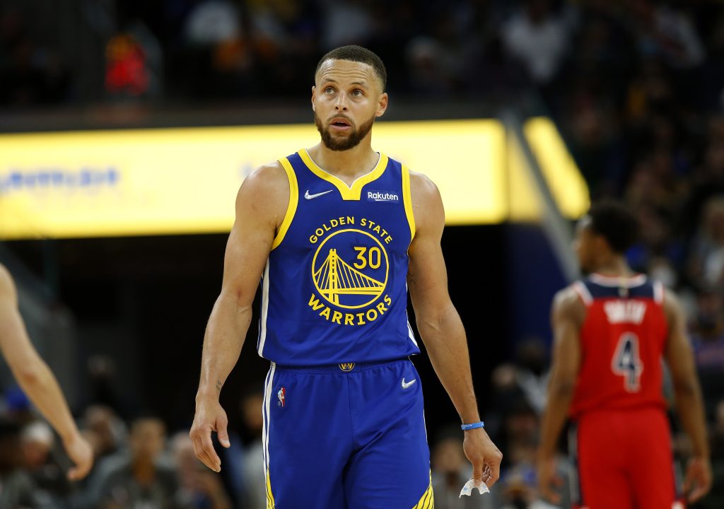 Golden State Warriors point guard Stephen Curry reacts to a play against the Washington Wizards.