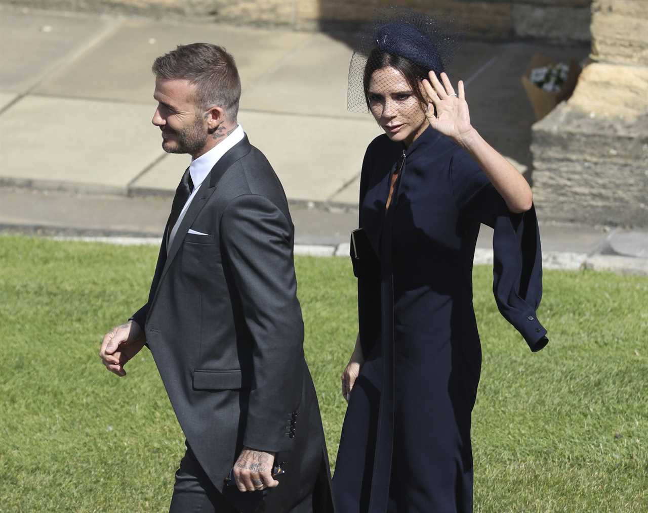 David and Victoria Beckham arrive for the wedding ceremony of Prince Harry and Meghan Markle at St. George's Chapel in Windsor Castle in Windsor, near London, England, Saturday, May 19, 2018. (Andrew Milligan/pool photo via AP)