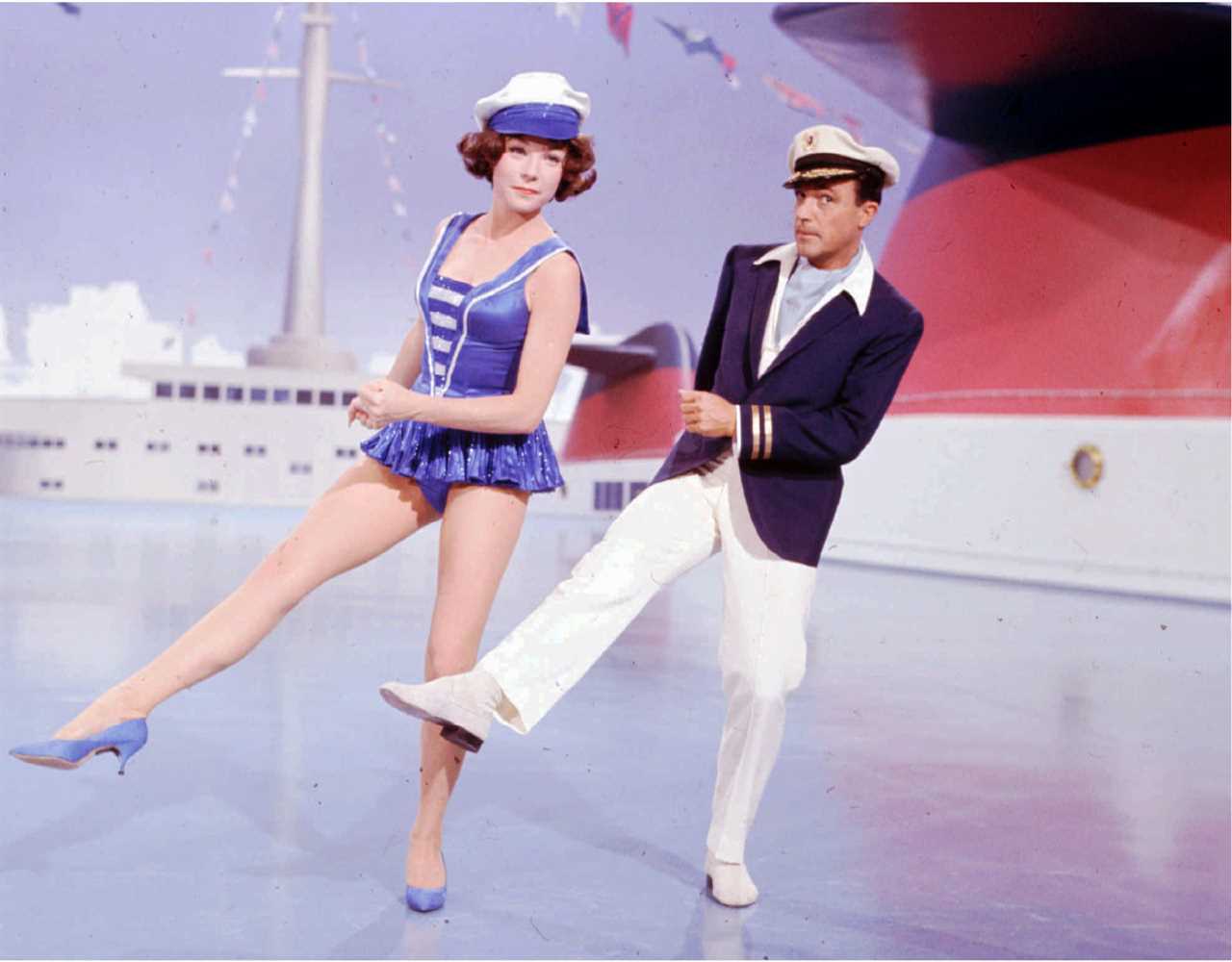 Gene Kelly dances with Shirley MacLaine during the making of the movie "What A Way To Go" Sept. 10, 1963