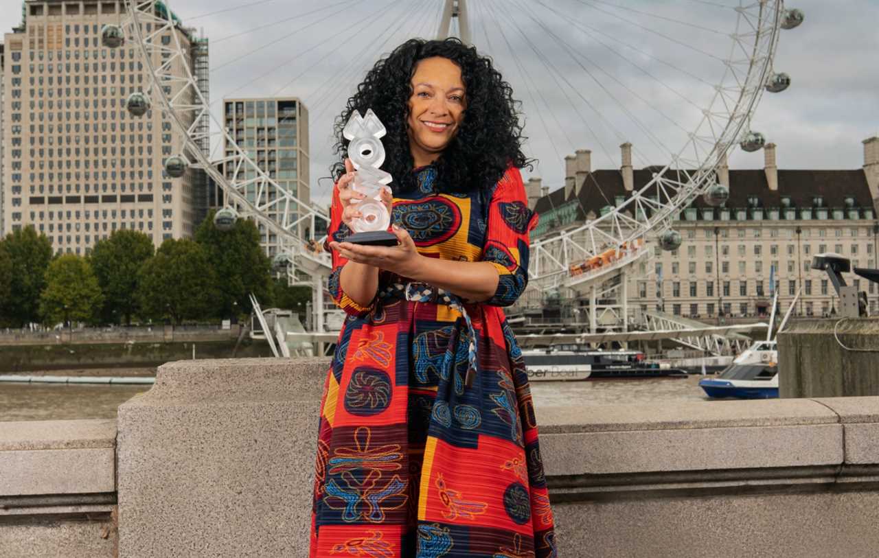 Kanya King holding a MOBO Award