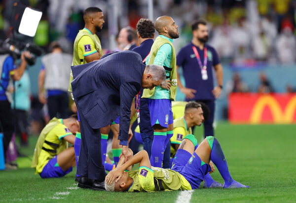 Brazil’s Tite consoled his players, but he could not appease his critics.