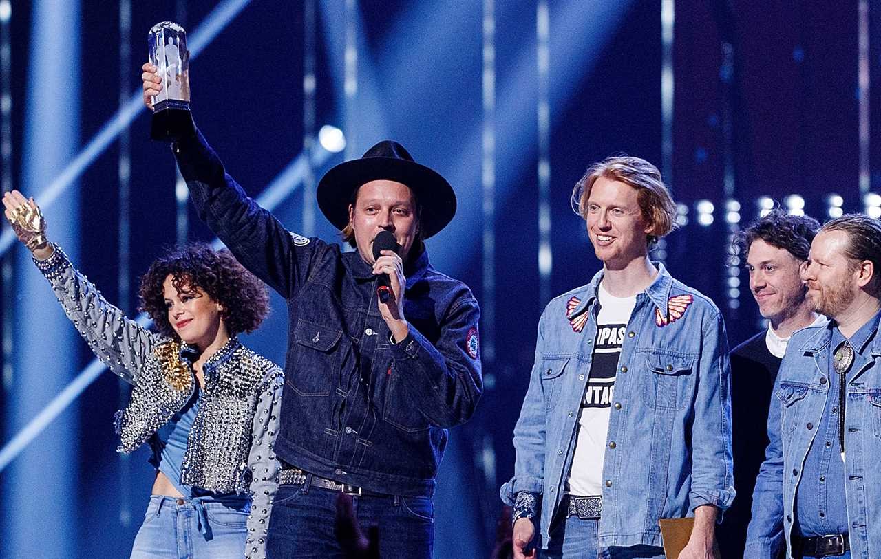Arcade Fire receiving an award during the 2018 Juno Awards ceremony
