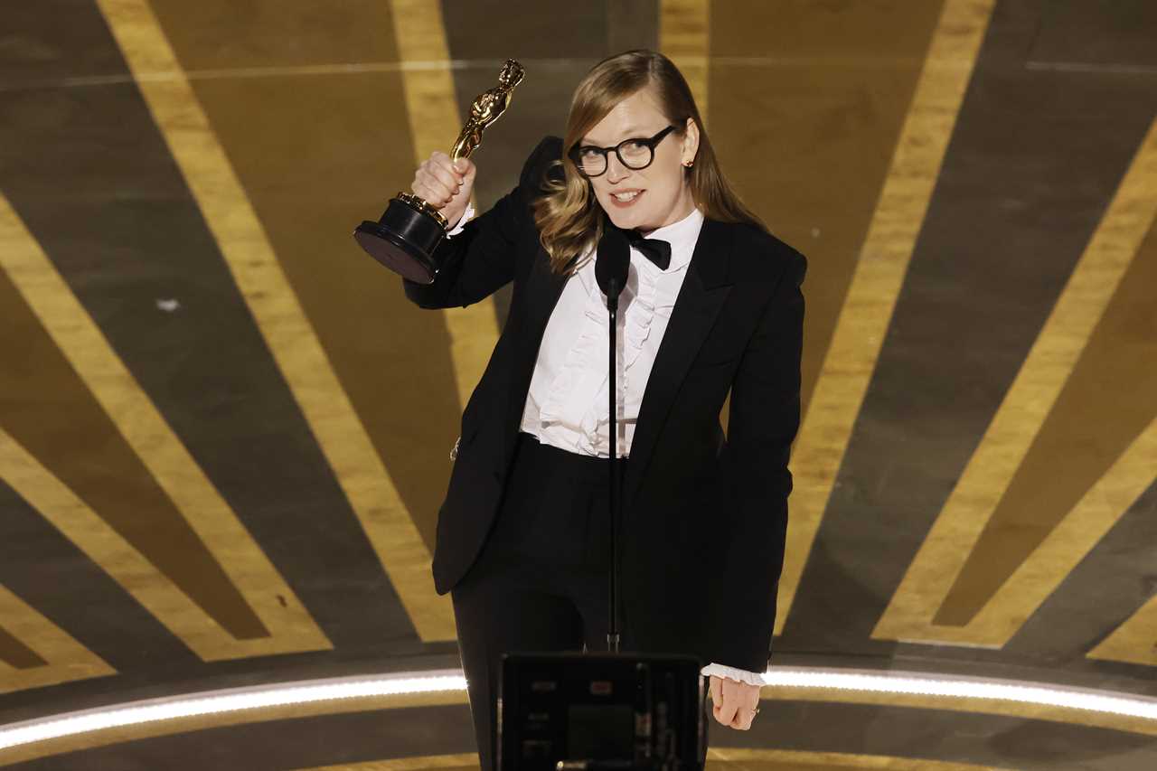 HOLLYWOOD, CALIFORNIA - MARCH 12: Sarah Polley accepts the Best Adapted Screenplay award for "Women Talking" onstage during the 95th Annual Academy Awards at Dolby Theatre on March 12, 2023 in Hollywood, California. (Photo by Kevin Winter/Getty Images)