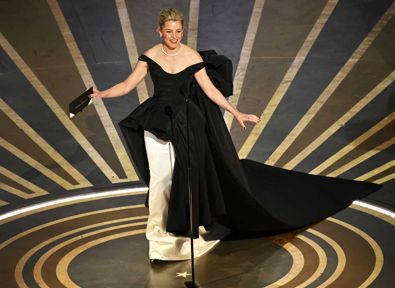 Elizabeth Banks Trips On Stage While Presenting During the Oscars and Blames