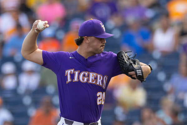 Paul Skenes prepares to deliver a pitch.