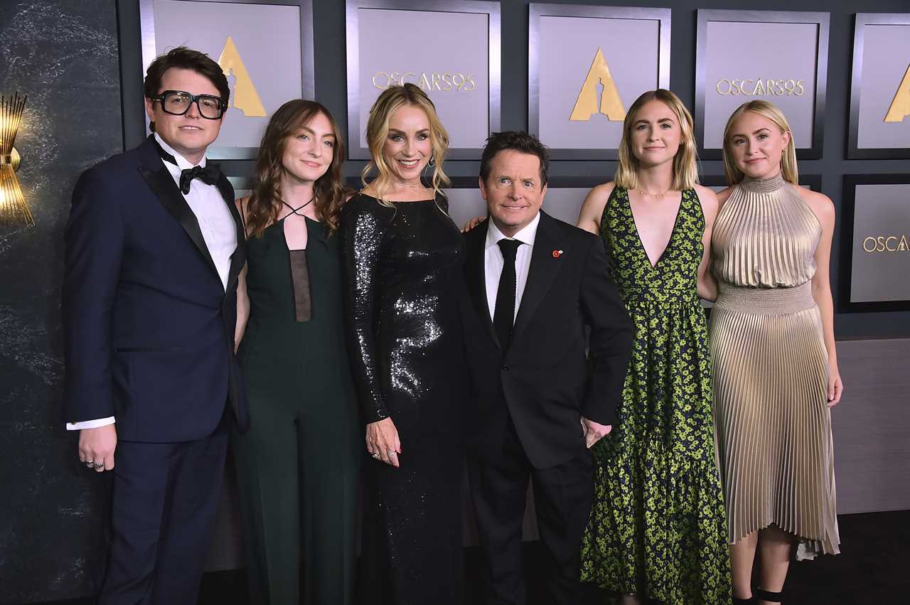 From left, Sam Fox, Esme Fox, Tracy Pollan, Michael J. Fox, Schuyler Fox and Aquinnah Fox arrive at the Governors Awards on Saturday, Nov. 19, 2022, at Fairmont Century Plaza in Los Angeles. (Photo by Jordan Strauss/Invision/AP)