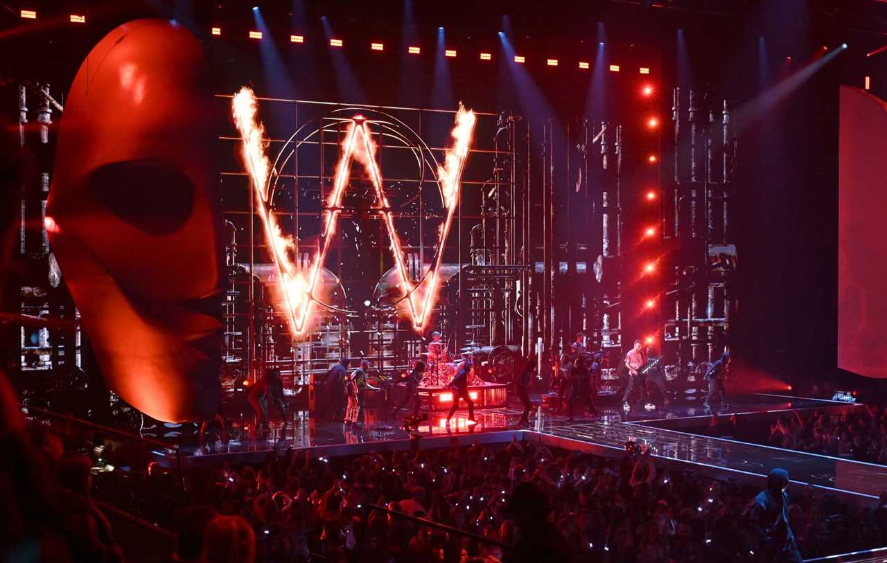 Muse perform on stage during the MTV Europe Music Awards 2022 held at PSD Bank Dome on November 13, 2022 in Duesseldorf, Germany.