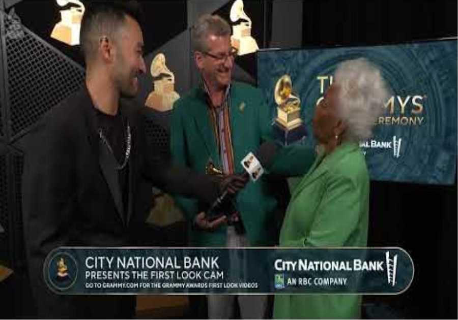 ROBERT GORDON AND DEANIE PARKER Checks In At The CNB First Look Cam At The 2024 GRAMMYs
