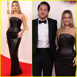 Margot Robbie Ditches Barbie Pink for Liquid Black Dress at Oscars 2024