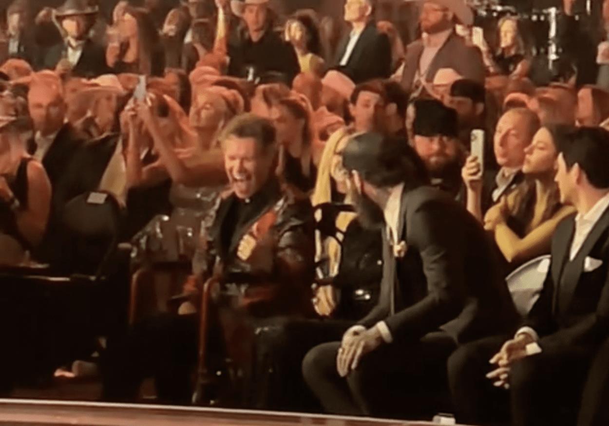 Post Malone Had Randy Travis Cracking Up At The ACM Awards & It’s The Most Heartwarming Thing You’ll See Today