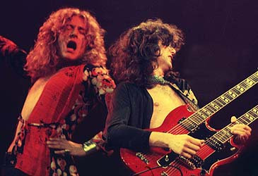 Robert Plant and Jimmy Page performing on stage (Getty)