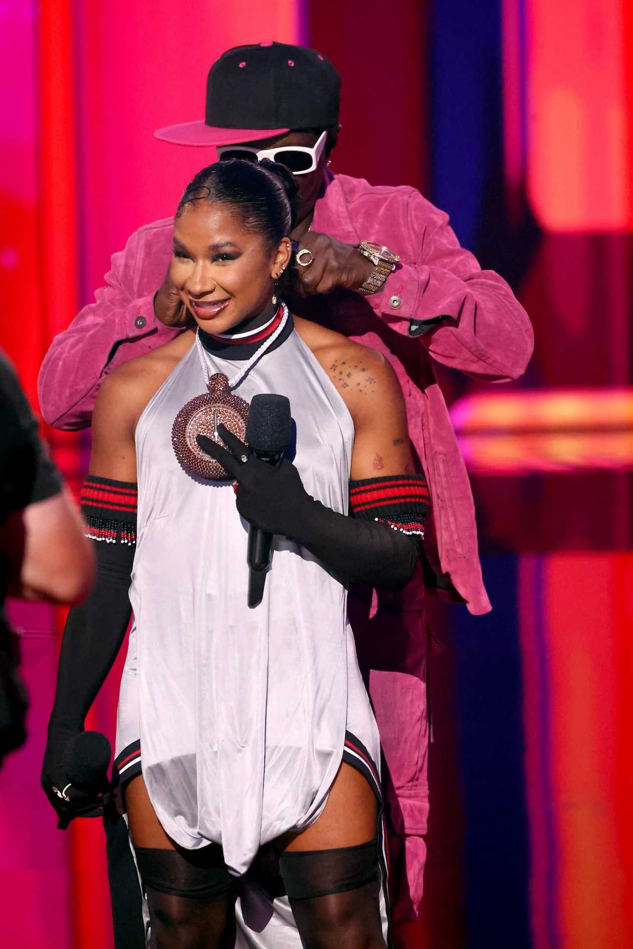 Flavor Flav Turns 2024 MTV VMAs Into Olympic Moment for Jordan Chiles Gifts Her Bronze Clock