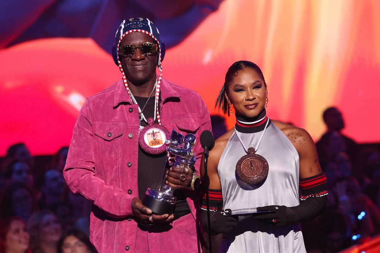 Flavor Flav Turns 2024 MTV VMAs Into Olympic Moment for Jordan Chiles Gifts Her Bronze Clock