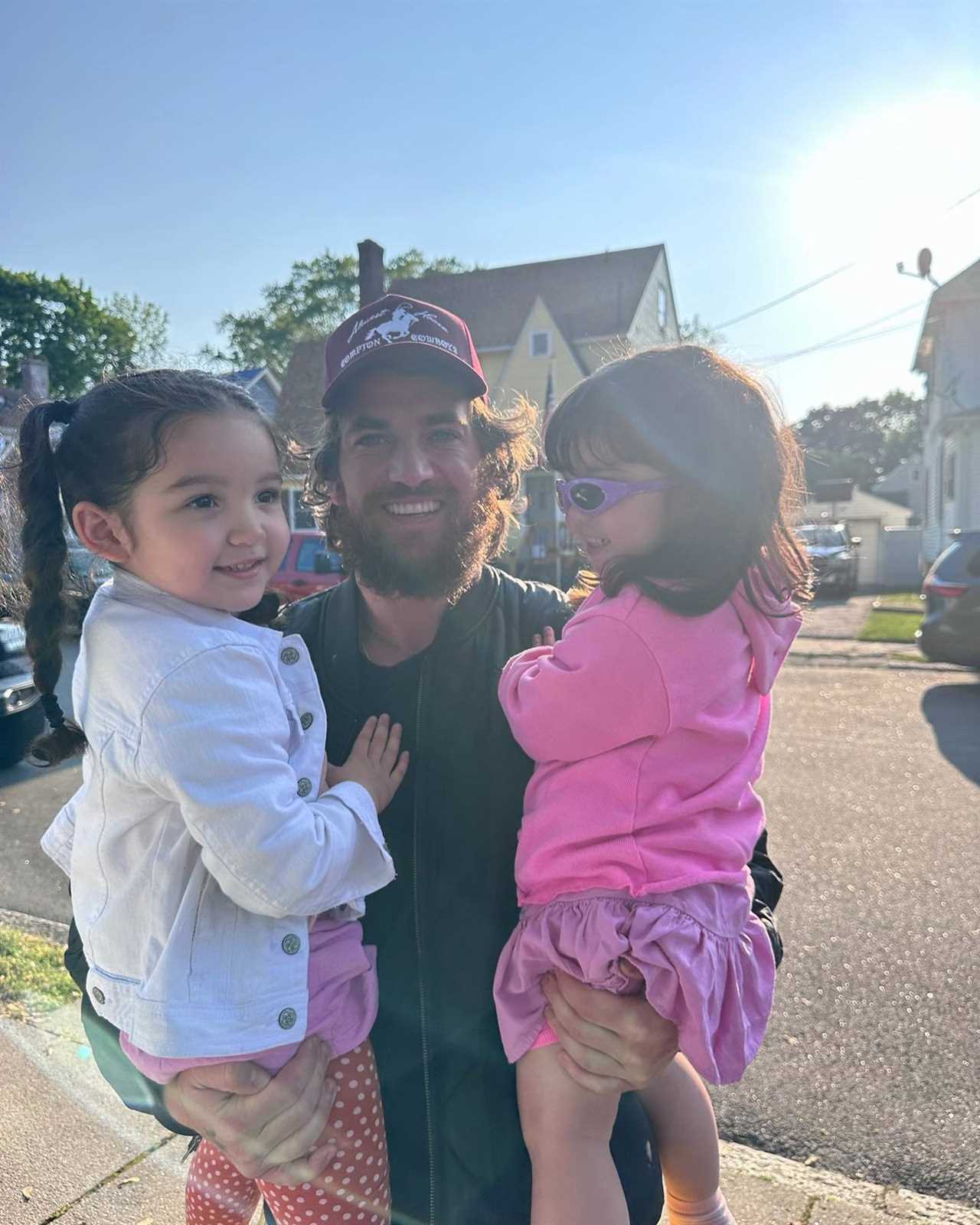 Singer Cassie's husband, Alex Fine, with their two daughters