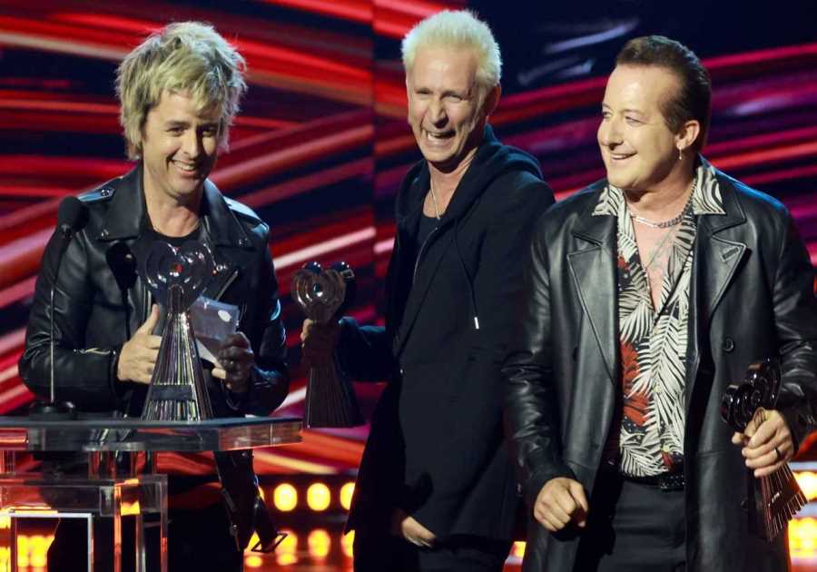 Green Day spoof ‘Boogie Nights’ with deadpan iHeartRadio Awards speech: “Let’s keep rocking and rolling” 