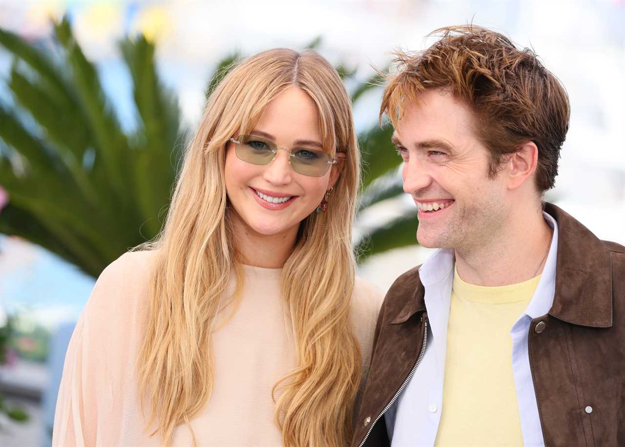 Jennifer Lawrence and Robert Pattinson during the Die My Love photocall at the 78th annual Cannes Film Festival at Palais des Festivals on May 18, 2025 in Cannes, France.