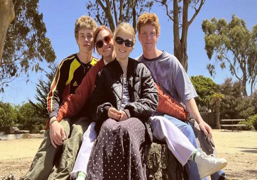 'Love these guys': Julia Roberts cuddles up close to her grown-up kids in rare family photo
