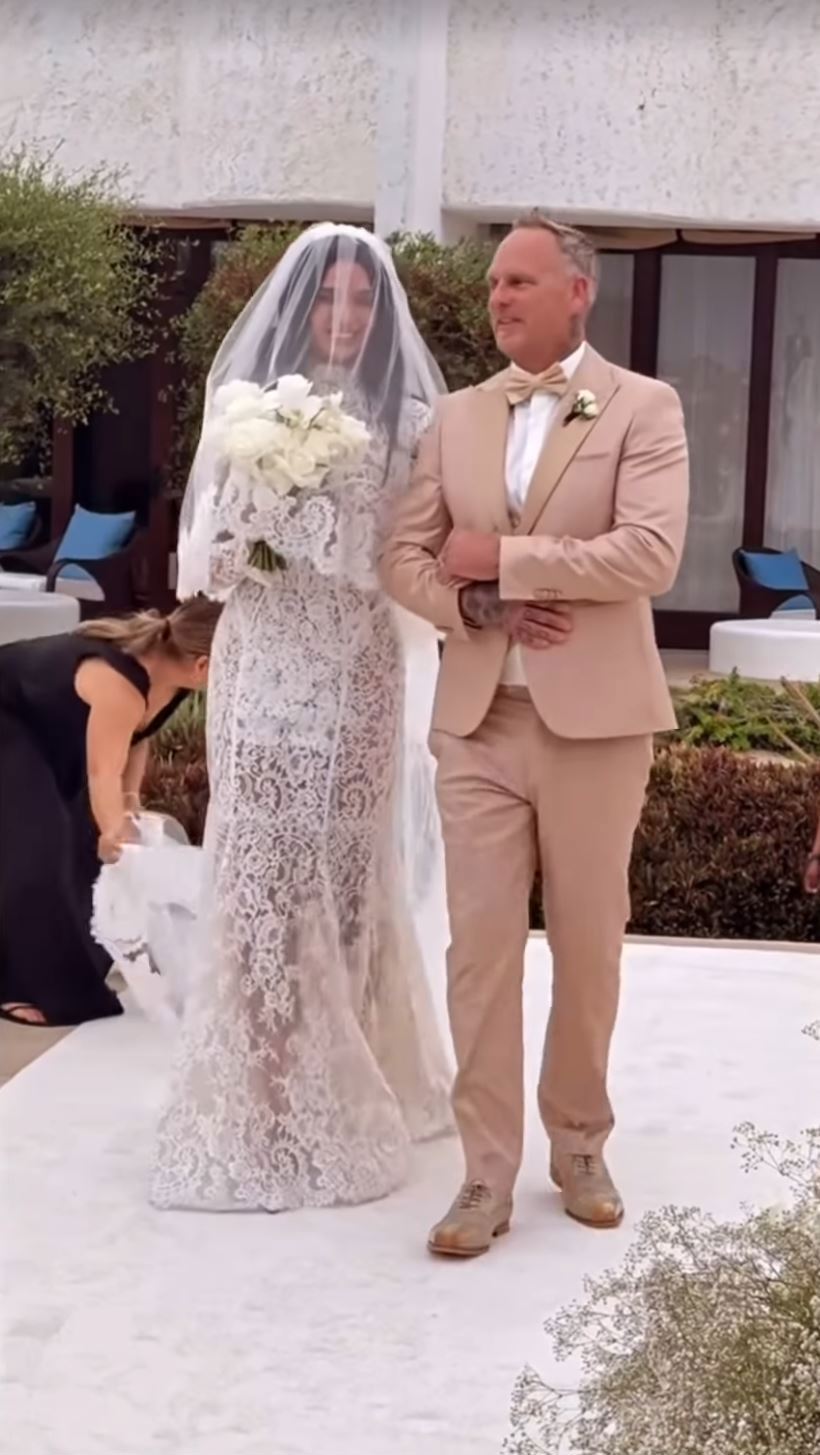 April Love Geary walks down the aisle with her dad