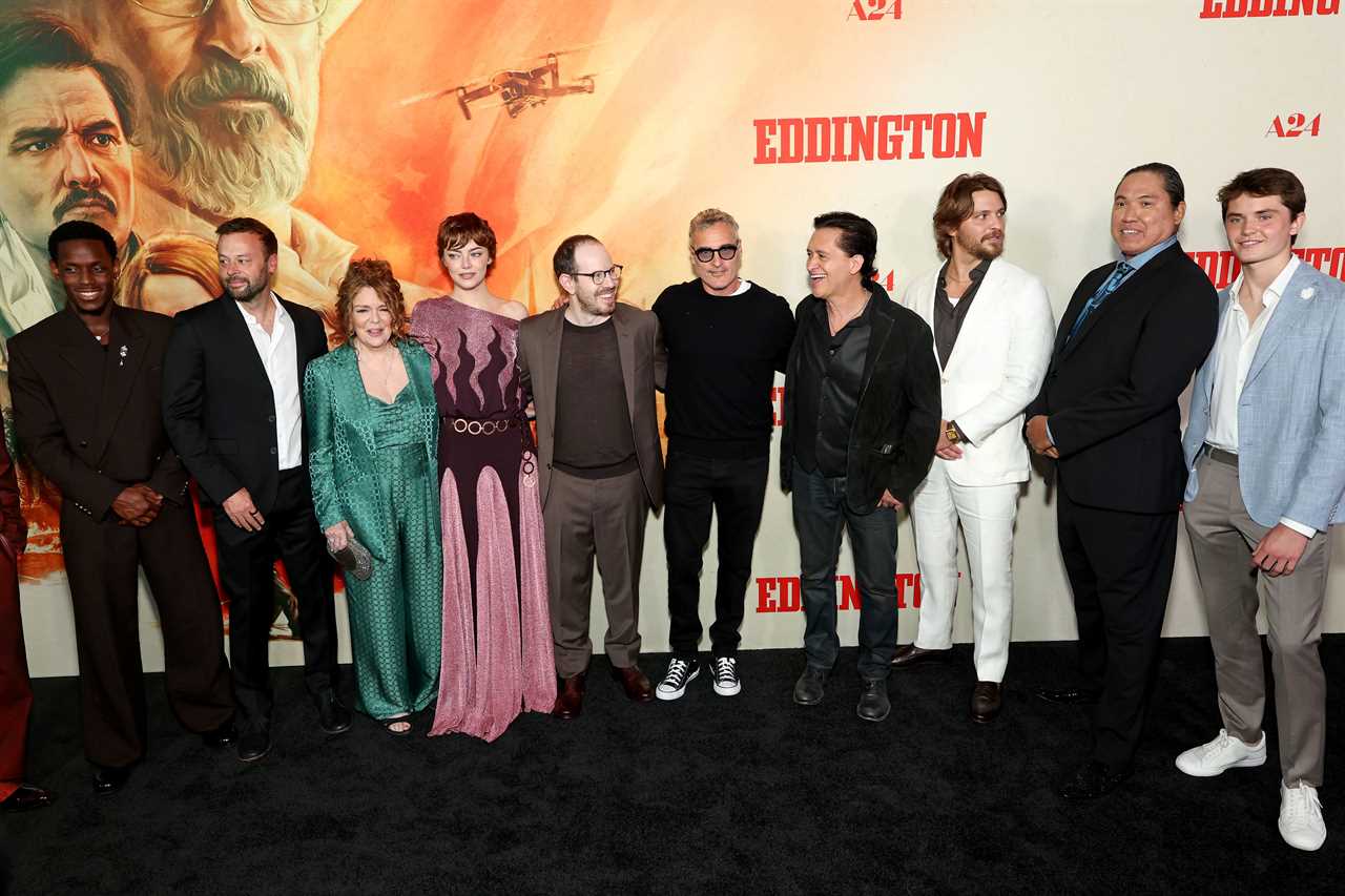 LOS ANGELES, CALIFORNIA - JUNE 26: (L-R) Micheal Ward, Lars Knudsen, Deirdre O'Connell, Emma Stone, Ari Aster, Joaquin Phoenix, Clifton Collins Jr., Luke Grimes, William Belleau and Cameron Mann attend the Los Angeles Premiere of A24's "Eddington" at DGA Theater Complex on June 26, 2025 in Los Angeles, California. (Photo by Monica Schipper/Getty Images)