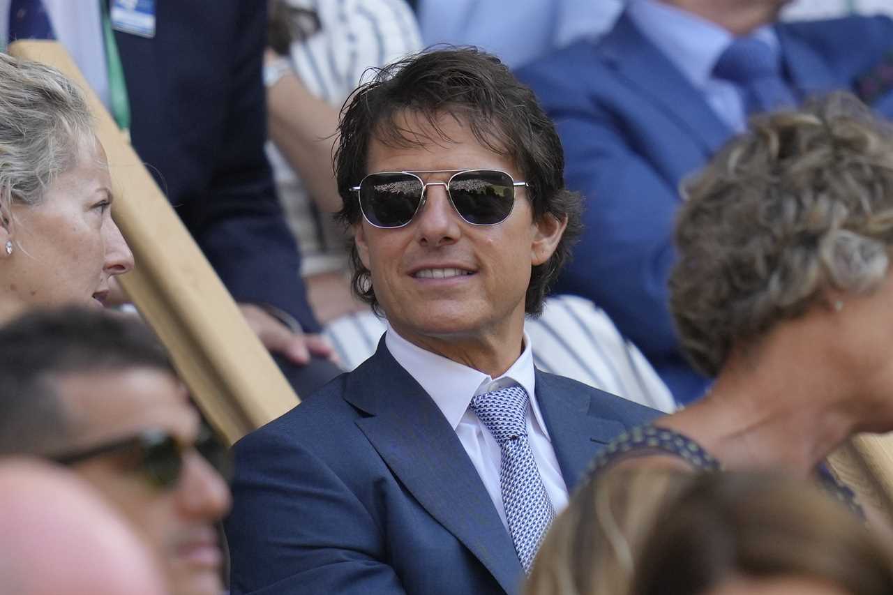 Film star Tom Cruise smiles sits in the Royal Box for the final of the women's singles between Tunisia's Ons Jabeur and Kazakhstan's Elena Rybakina on day thirteen of the Wimbledon tennis championships in London, Saturday, July 9, 2022