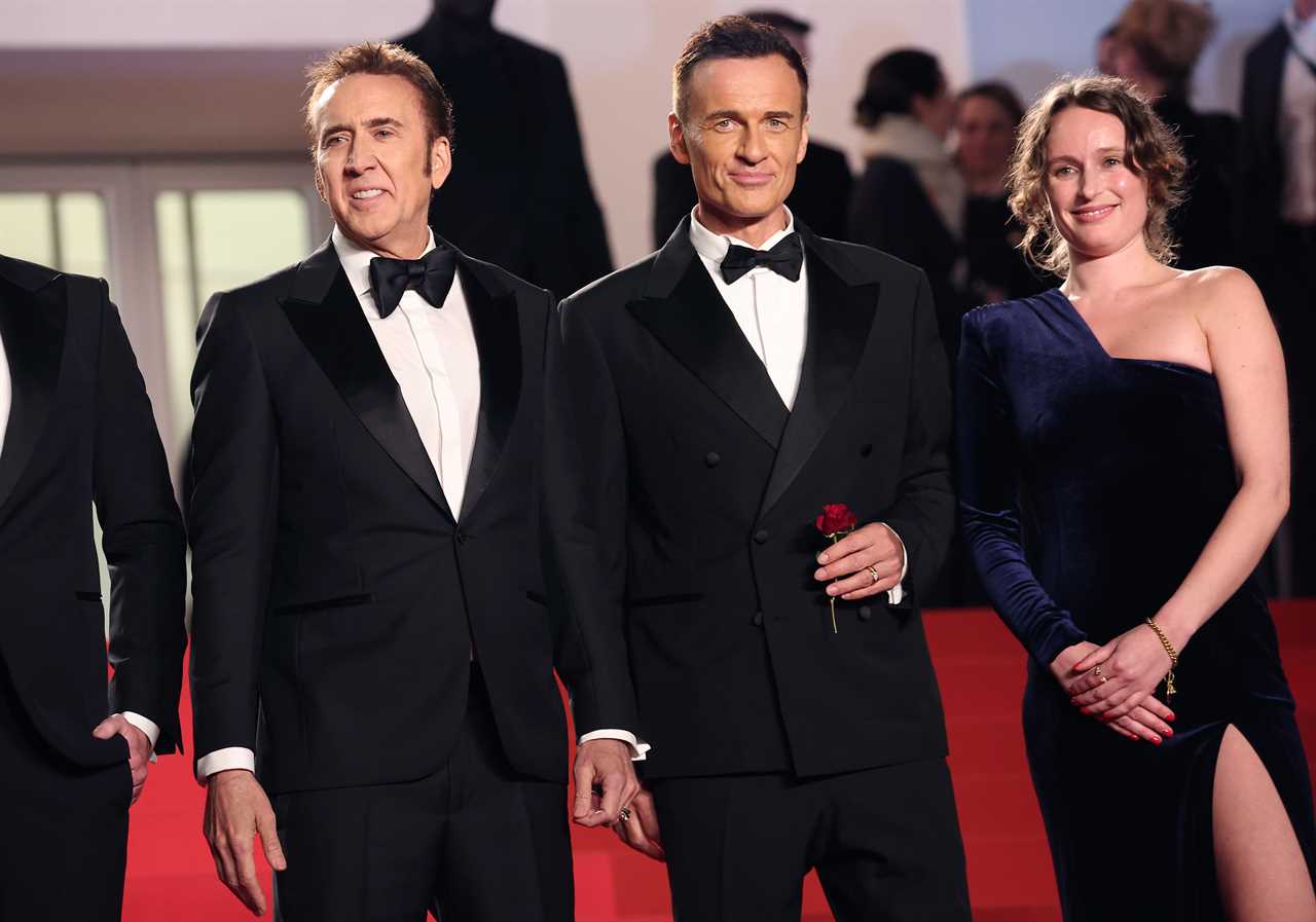 CANNES, FRANCE - MAY 17: Nicolas Cage, Julian McMahon and Leonora Darby attend the "The Surfer" Red Carpet at the 77th annual Cannes Film Festival at Palais des Festivals on May 17, 2024 in Cannes, France. (Photo by Gisela Schober/Getty Images)
