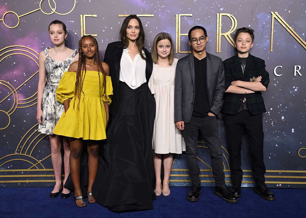 Angelina Jolie, third from left, and her children Shiloh, Zahara, Vivenne, Maddox and Knox at the London premiere of 'The Eternals' in 2021. **This image is for use with this specific article only**