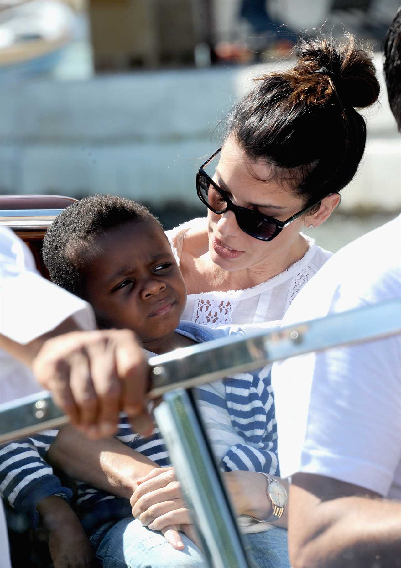 Sandra Bullock with son Louis during the 70th Venice International Film Festival on August 27, 2013 in Venice, Italy.