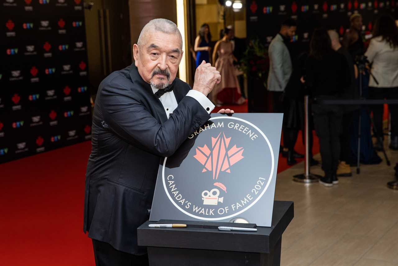 TORONTO, ONTARIO - DECEMBER 03: Graham Greene attends the unveiling of his Canadas Walk of Fame 2021 commemorative plaque for Arts & Entertainment during the 2022 Canada's Walk of Fame Gala at Beanfield Centre, Exhibition Place on December 03, 2022 in Toronto, Ontario. (Photo by Mathew Tsang/Getty Images)