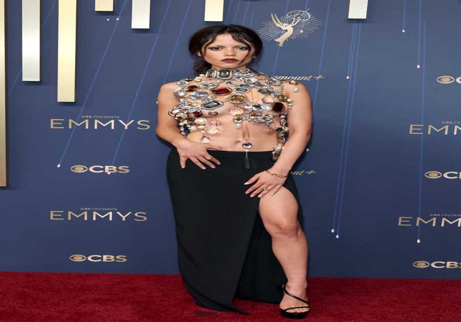 Jenna Ortega rocks the 'naked' trend by wearing nothing but jewels and a skirt on the Emmys red carpet  