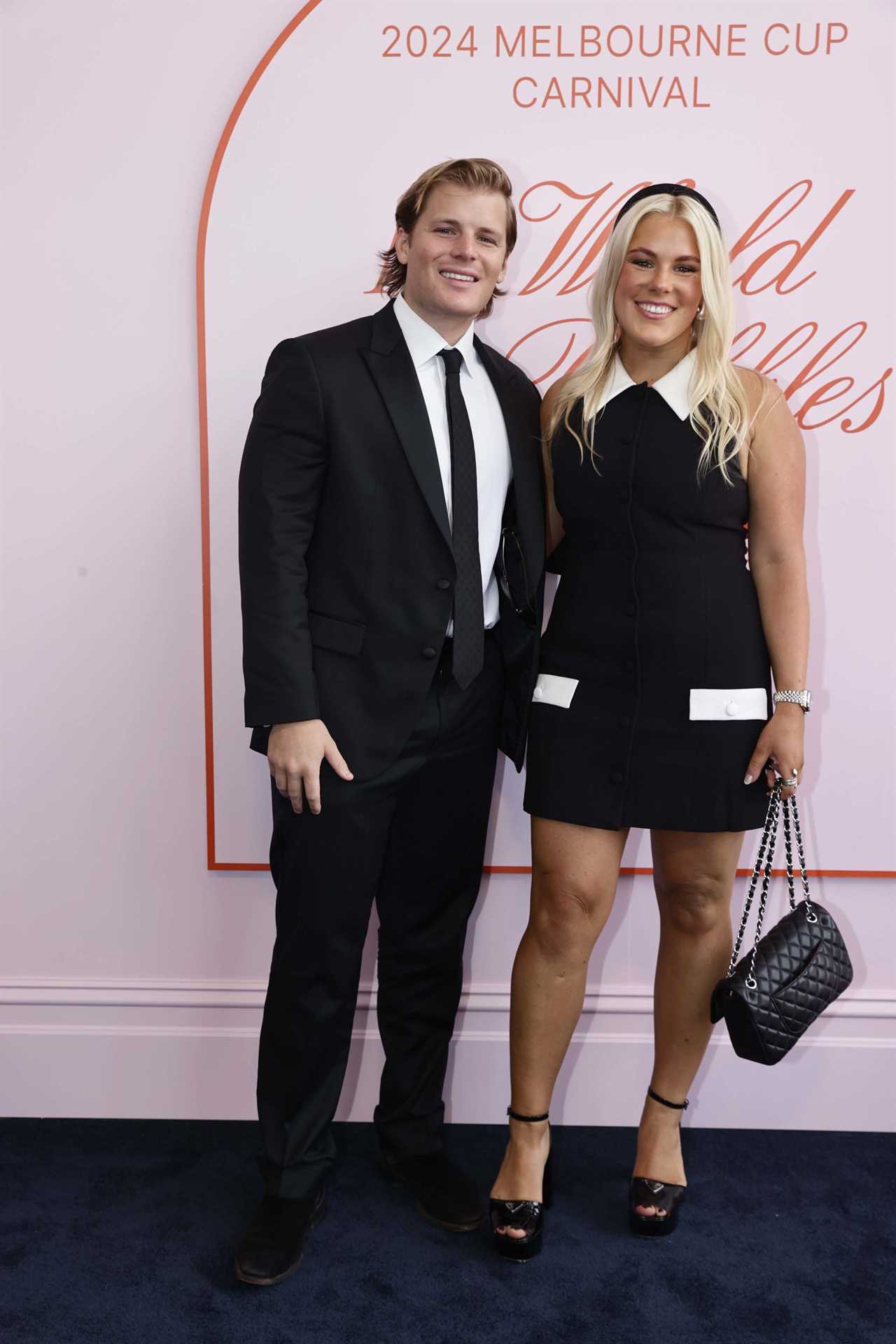 MELBOURNE, AUSTRALIA - NOVEMBER 02: Jackson Warne and Brooke Warne pose for a photo during 2024 Derby Day at Flemington Racecourse on November 02, 2024 in Melbourne, Australia. (Photo by Sam Tabone/Getty Images)