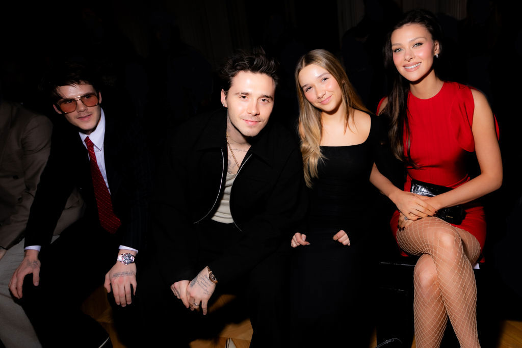 Cruz Beckham, Brooklyn Beckham, Harper Beckham, and Nicola Peltz Beckham at Victoria Beckham RTW Fall 2024 as part of Paris Ready to Wear Fashion Week held at Hôtel Salomon de Rothschild on March 1, 2024 in Paris, France. (Photo by Lodovico Colli di Felizzano/WWD via Getty Images)