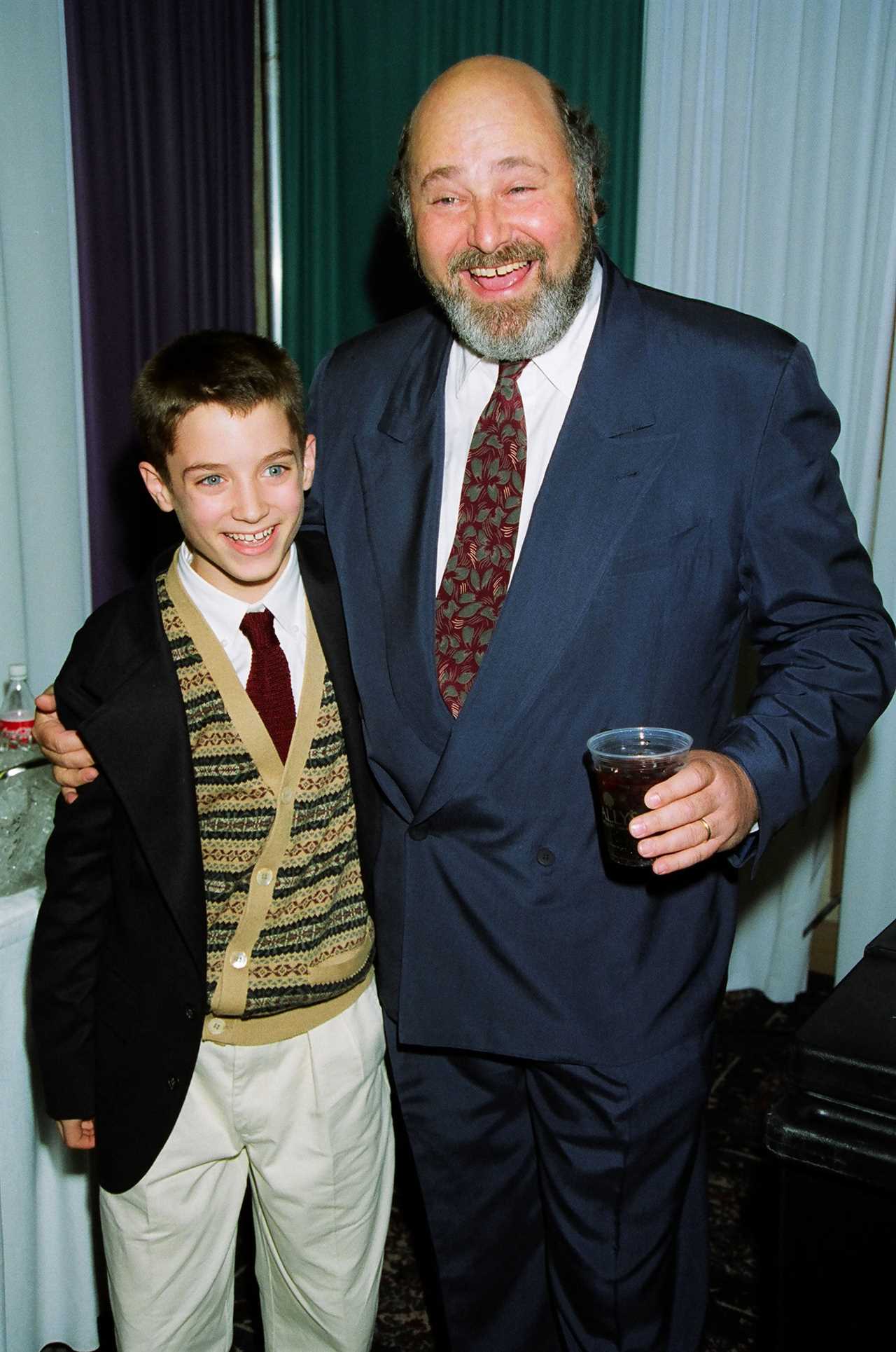 Elijah Wood and Rob Reiner in 1994