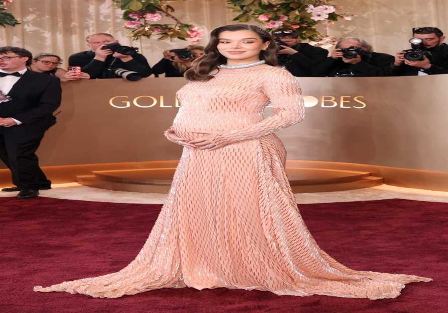 Pregnant Hailee Steinfeld Cradles Baby Bump on Golden Globes Red Carpet