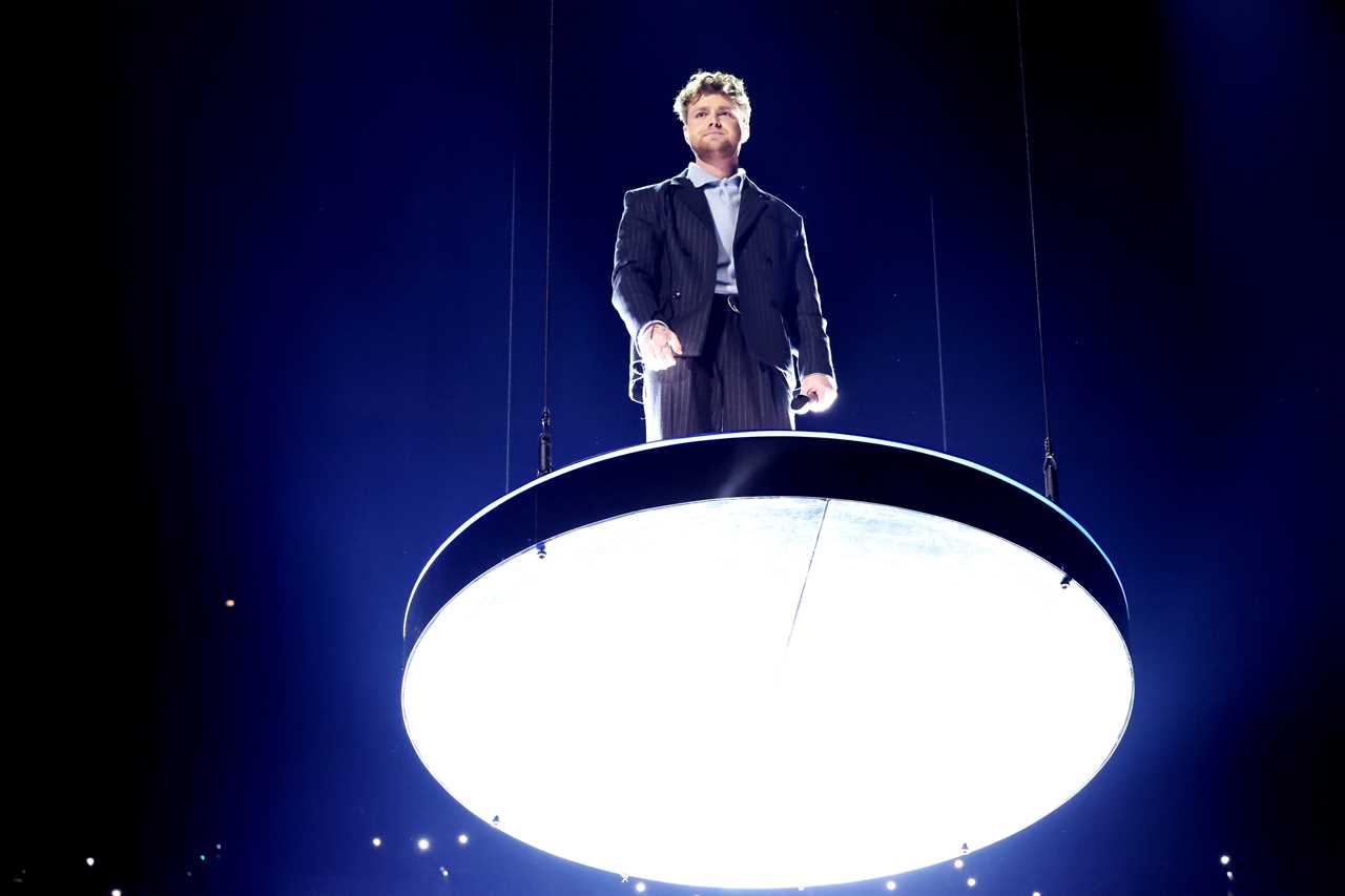 Alex Warren performing at the 2026 Grammys