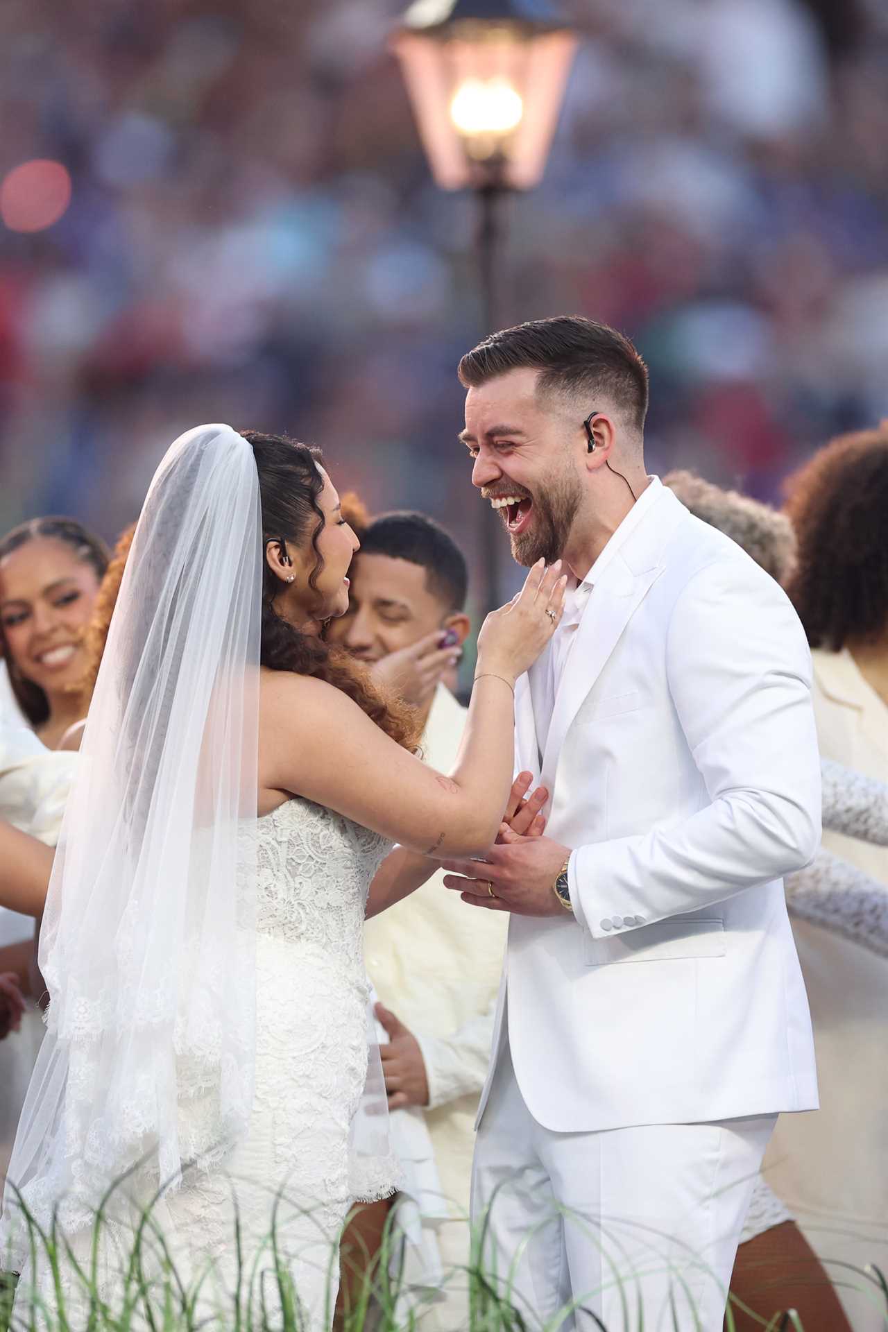 A couple marries during the Bad Bunny performance at the Super Bowl LX Halftime Show at Levi's Stadium on February 8, 2026 in Santa Clara, California. 