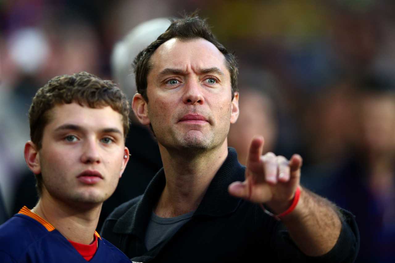 Jude Law and son Rafferty at a soccer match in Spain in 2016.