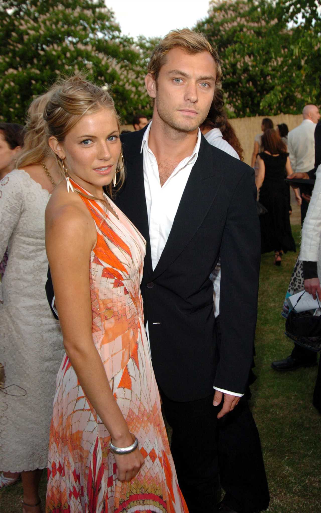 Sienna Miller and Jude Law in London in June 2004.