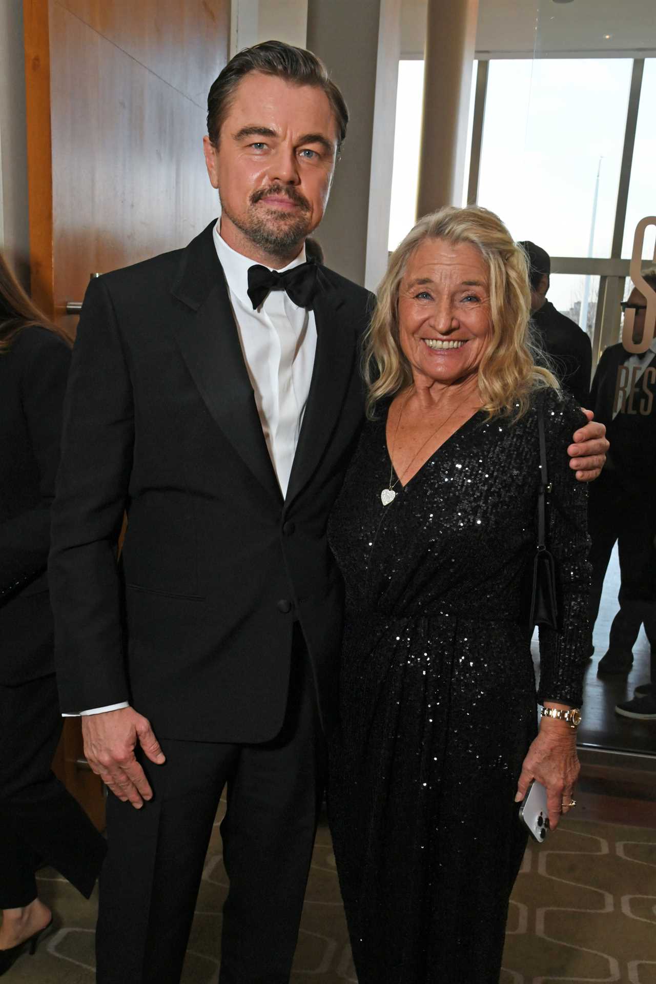 LONDON, ENGLAND - FEBRUARY 22: Leonardo DiCaprio and Irmelin Indenbirken, mother of Leonardo DiCaprio, attend the EE BAFTA Film Awards 2026 Champagne Reception at The Royal Festival Hall on February 22, 2026 in London, England. (Photo by Dave Benett/Getty Images for BAFTA)