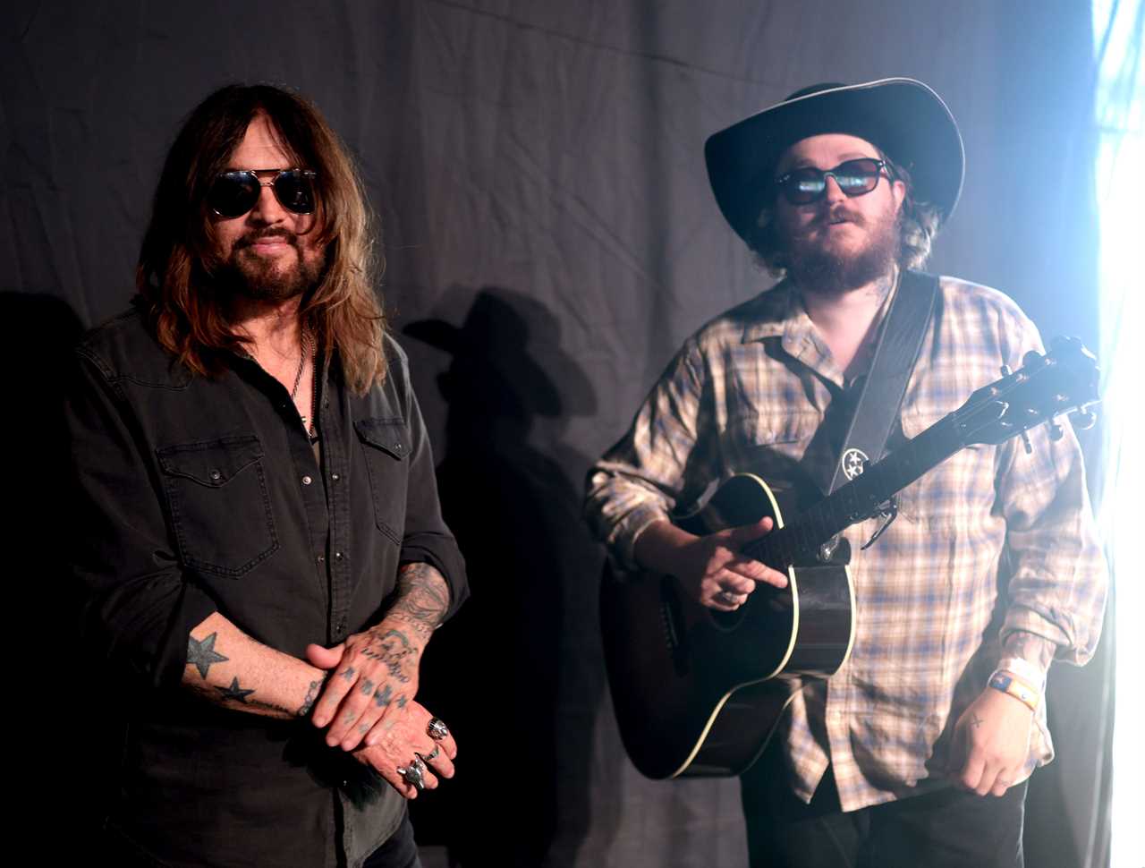 (L-R) Billy Ray Cyrus and Braison Cyrus pose for a portrait backstage during the 2026 Stagecoach Festival at Empire Polo Club on April 24, 2026 in Indio, California. (Photo by Matt Winkelmeyer/Getty Images for Stagecoach)