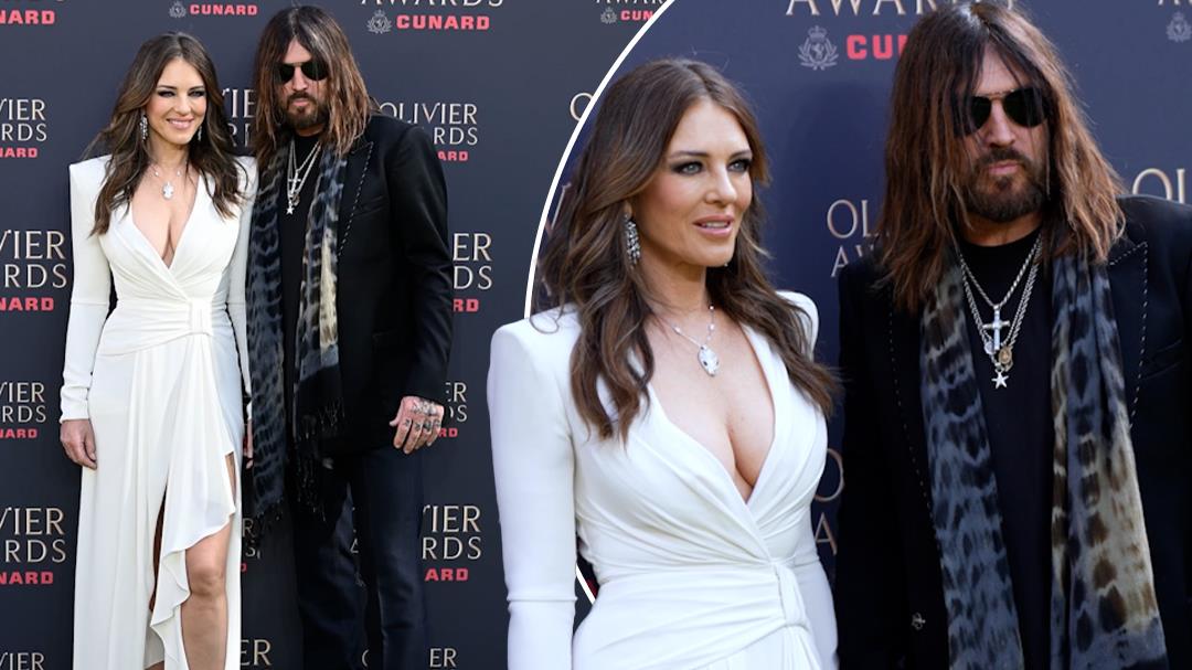 Elizabeth Hurley and Billy Ray Cyrus attend The Olivier Awards