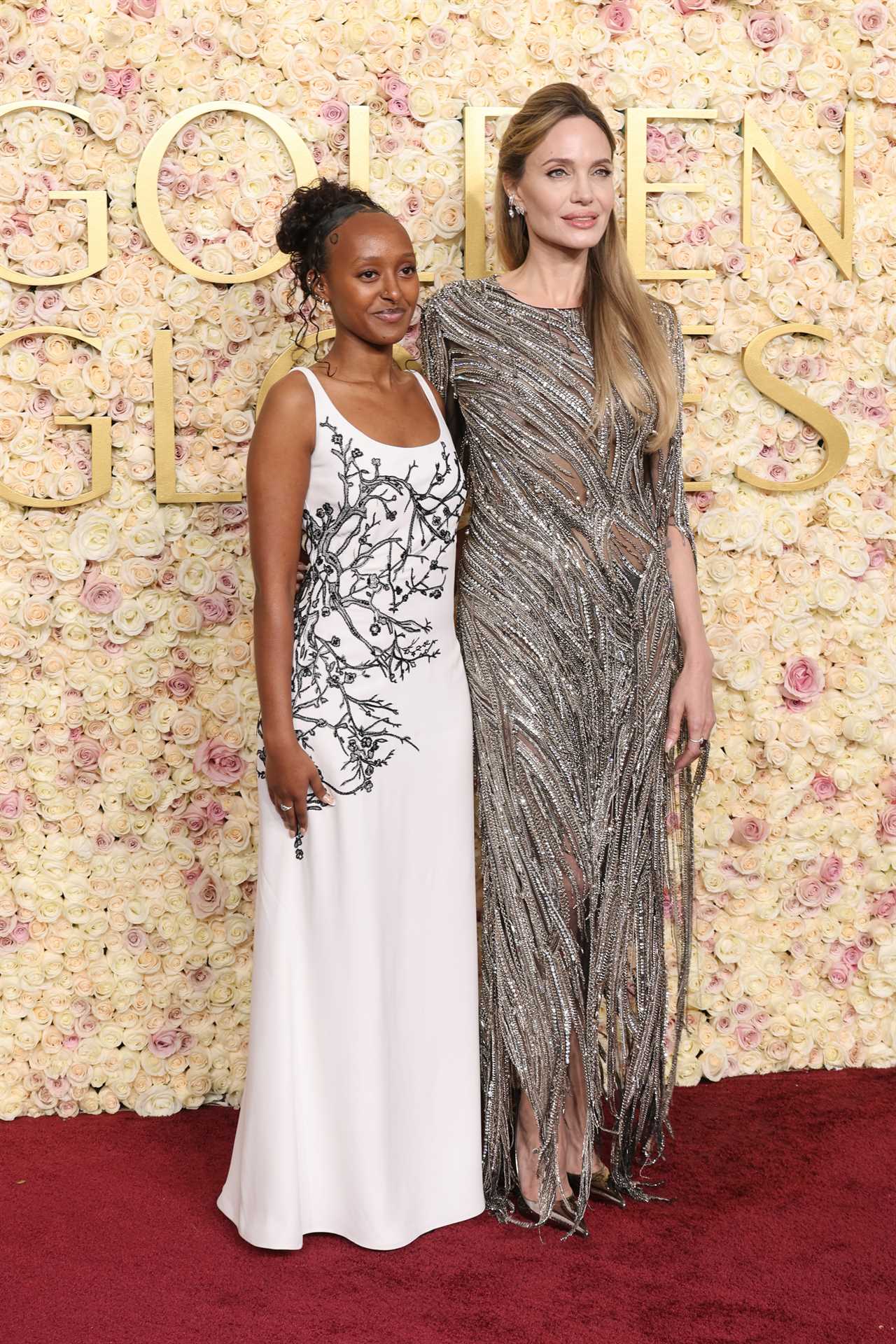 Zahara Jolie and Angelina Jolie attend the 82nd Annual Golden Globe Awards at The Beverly Hilton on January 05, 2025 in Beverly Hills, California. 
