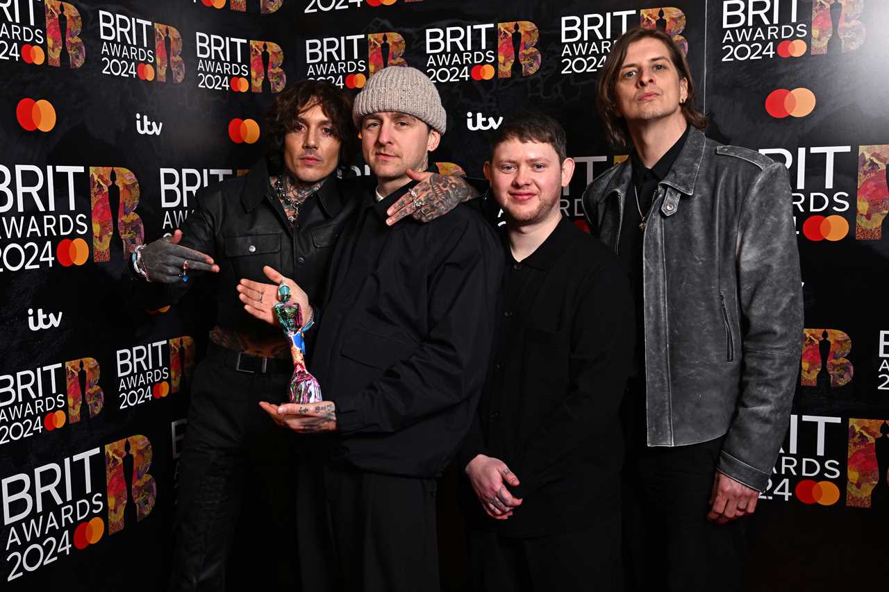 LONDON, ENGLAND - MARCH 02: (EDITORIAL USE ONLY. NO PUBLICATIONS DEVOTED EXCLUSIVELY TO THE ARTIST)  (L-R) Oliver Sykes, Matt Nicholls, Lee Malia, and Matt Kean of "Bring Me The Horizon" pose with their Best Alternative/Rock Act award in the winners room at the BRIT Awards 2024 at The O2 Arena on March 02, 2024 in London, England. (Photo by Kate Green/Getty Images)