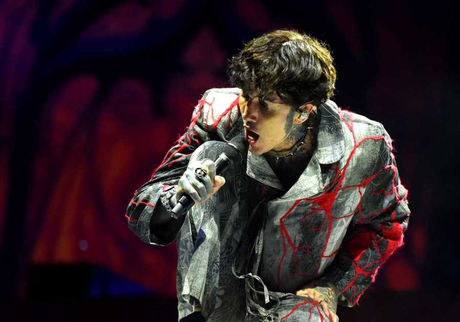 Rocker Oli Sykes left with a concussion after getting hit in the head by a phone mid-performance